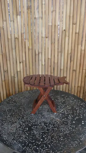 Product image 1 of the product “Folding table in shape of fish, made of wood. 33cm Height. Dark Brown lacquered. ”